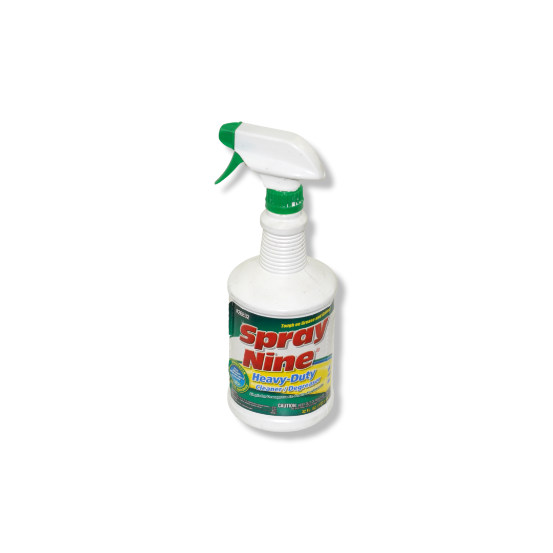 A spray bottle with a green cap on it.