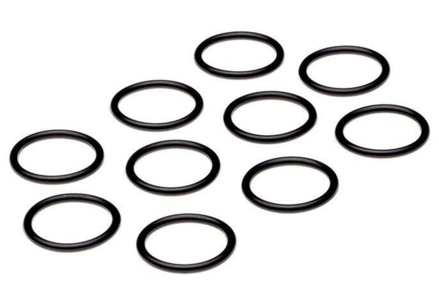 A group of black rubber rings on top of a white surface.