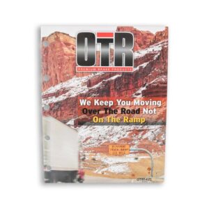 A magazine cover with an image of a truck on the side.
