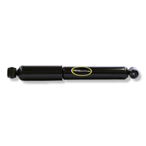 A black shock absorber is on the ground.