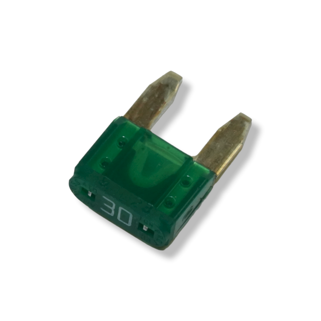 A green automotive fuse