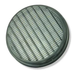 A round light with a grill on top of it.