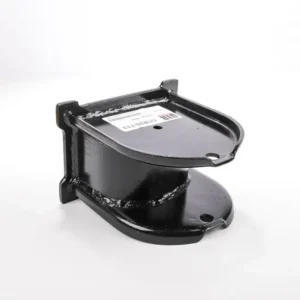 A black metal object sitting on top of a white table.