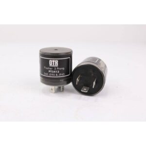 A pair of black and silver capacitors sitting next to each other.