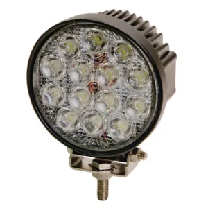 A round led light is on the side of a car.