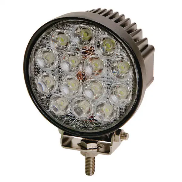 A round led light is on the side of a car.