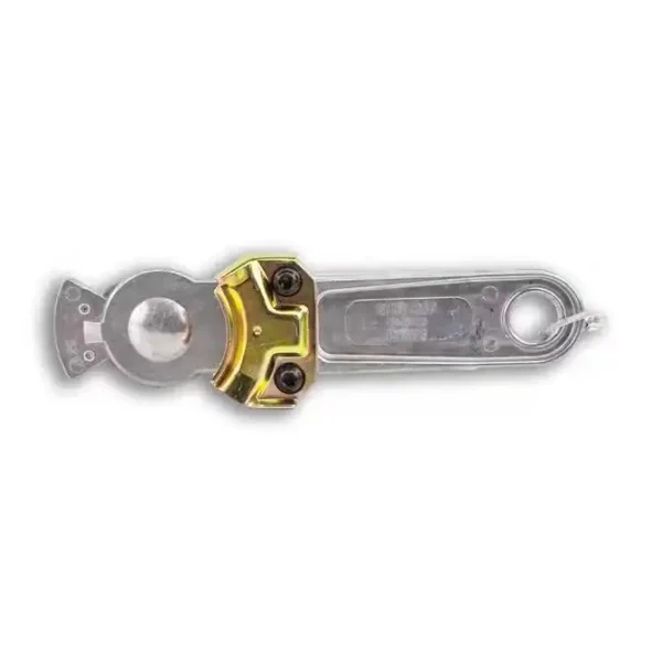 A yellow and silver key is on top of a white background