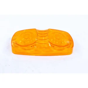 A plastic object is sitting on the ground.