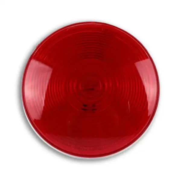 A red light that is on the side of a road.