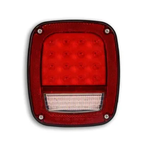 A red and white light on top of a white background.