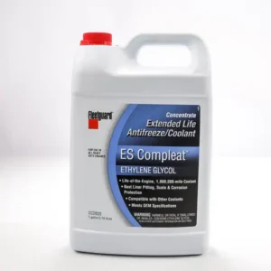 A white container of antifreeze coolant sitting on top of a table.